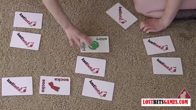 Two Girls play a strip game of match the cards