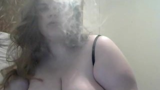 Big Tit Milf While Playing With Her Big Tits And Hard Nipples The Wife Of A Huge DDD Tit Smokes