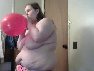 hot wife blow up balloon andmake it pop slpaiing her titsand eyes