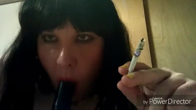 Ts Natalie Jenkins Smoking and sucking on a dildo 8
