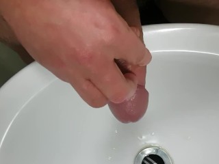 Pissing into my foreskin before massaging_my glans_to orgasm