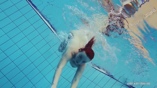 Underwater trample fetish Redheaded katrin stripping underwater