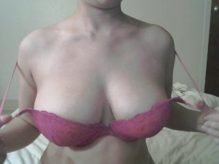 Huge Natural Tits Held By Pink Bra