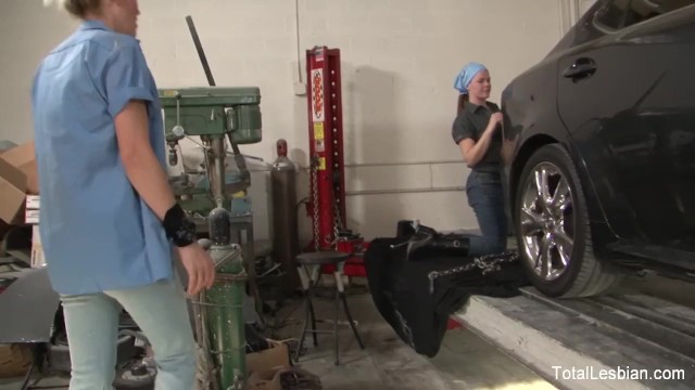 Slutty lesbians having fun in the public garage - Daisy Layne