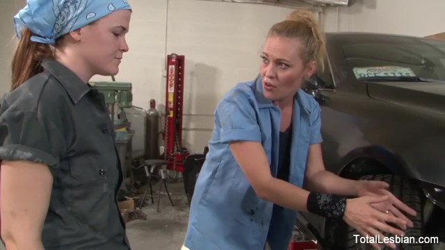 Slutty lesbians having fun in the public garage - Daisy Layne