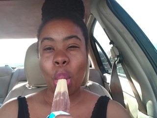 Ebony_Big Lips Sucking Ice cream Pop Outside in_Car - Cami Creams