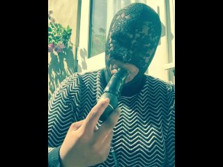 Masked_ebony bbw smoking outside in back garden sucking vibrator_in secret