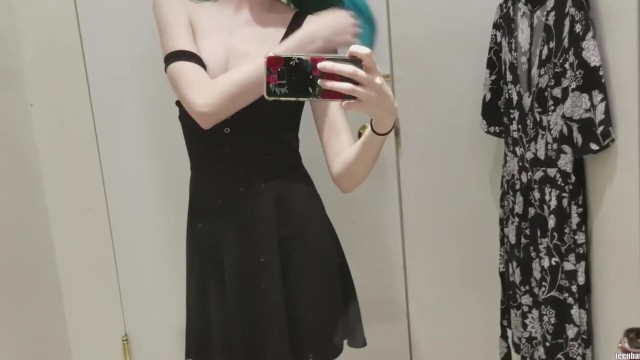 skinny gothic girl taking a selfie at hudson bay dressing room 4