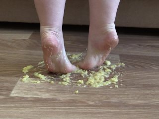 Milf Crushes A Banana Bare Feet
