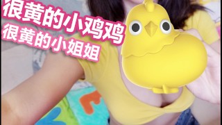 A Bright Yellow Woman And A Bright Yellow Chicken