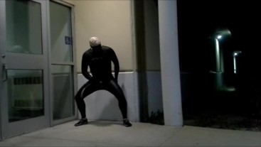 masked skinhead in orca wetsuit jerks off and pisses outside of doors