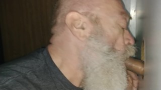 At Glory Hole Daddy Bear Sucks Cock