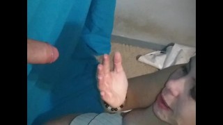 Young milf sucks dick at a glory hole
