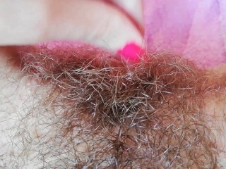 Playing with my big clit hoodpulling and stretching hairy bush pussyclose