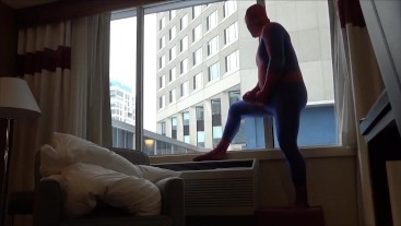 spiderman shows his hard cock to office workers from his hotel room
