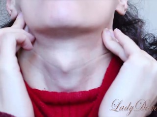 Sexy Adam's apple girl playing with a choker