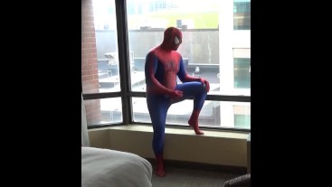 spiderman showing his hard cock at window
