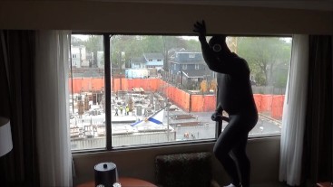 frogman cums on window watching construction workers across street
