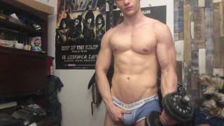 Chris Wild Exercises His Biceps And Masturbates His Large Cock