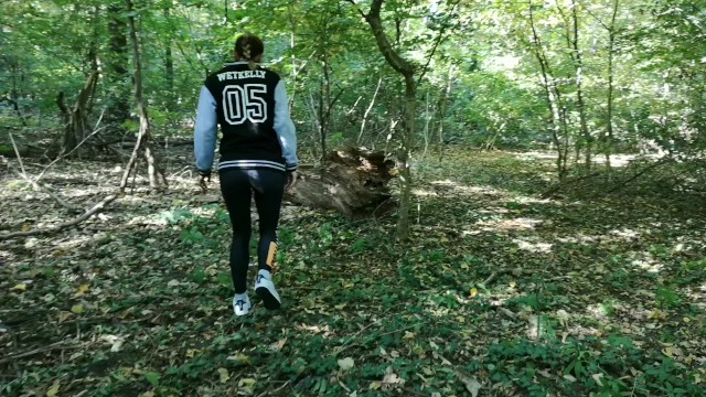 Hot girl peeing in public while walking in the forest. WetKelly 2