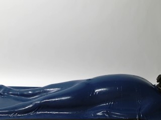 Mistress wearing Latex torturing trapped Slave_in Rubber Vacuum Bed VacBed