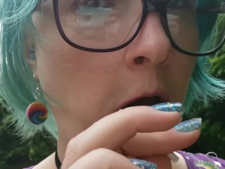 Seattle Ganja Goddess the Queen of Pussy Pops sucking lollipops:Cemetery Halloween licking candy