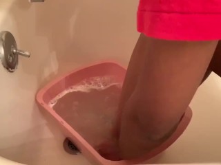 I Bathing andlotion my petite ebony feet