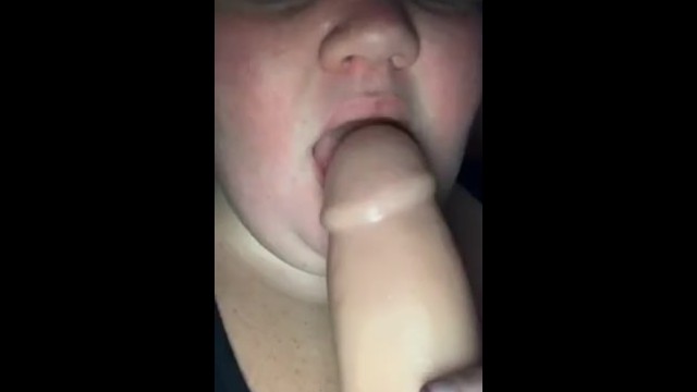 Sucking on a dildo 14
