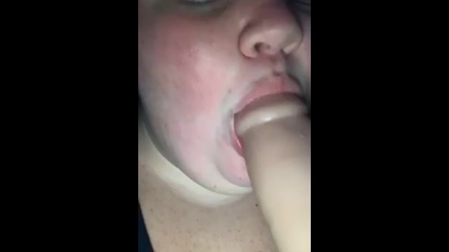 Sucking on a dildo 14