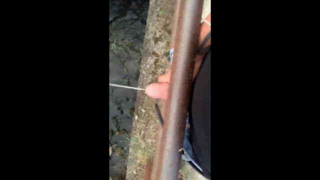 Twink Piss from the Bridge into the River