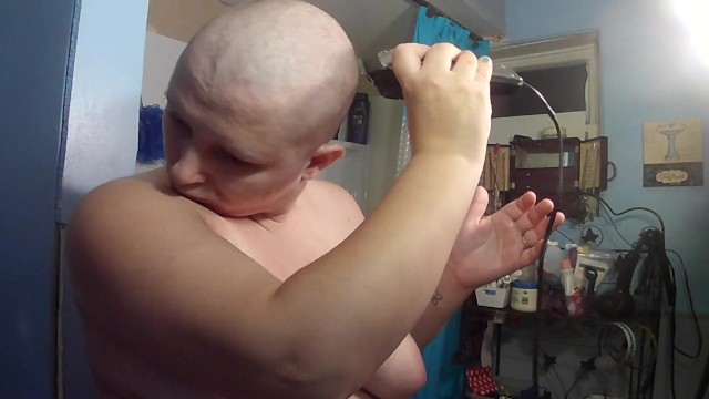 Topless bald girl shaving head 17