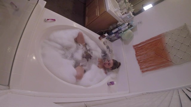 Stacked MILF masturbating in bathtub 9