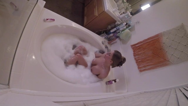 Stacked MILF masturbating in bathtub 9