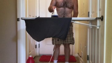 Dude Ironing Shorts & Shirt In His Underwear