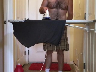 Dude Ironing Shorts & Shirt In His Underwear