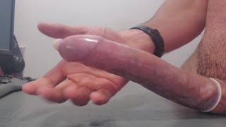 Big Cock Multiple Cumshots In A Condom Tied Together With Some Ball Torture Fun For All
