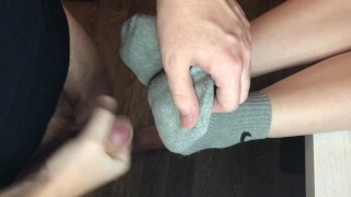 teen sockjob with gray nike socks, footjob teen socks after gym fuck cum