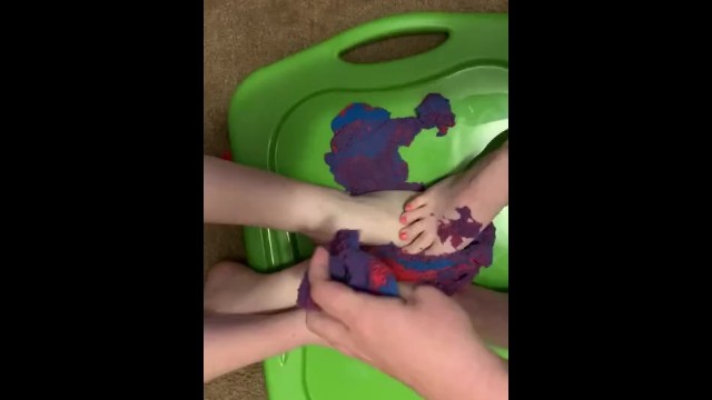 Ambriel and Remi play with kinetic sand 