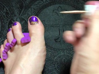 Painting my toes for you to suck and worship