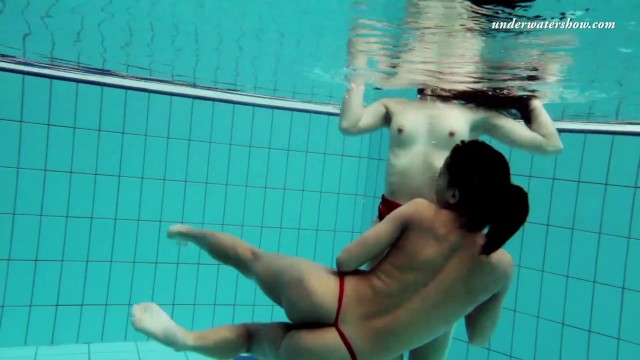 Nina Markova and Zlata Oduvanchik swimming naked in the pool