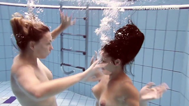 Iva Brizgina and Paulinka hot softcore lesbians in the pool