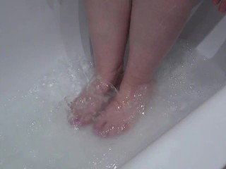 a mature lady washes_her legs. foot fetish