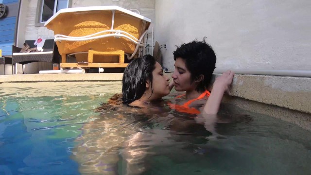 girls playing in the pool