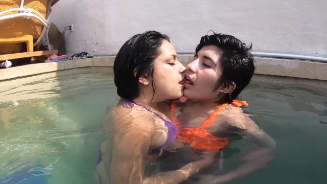 girls playing in the pool