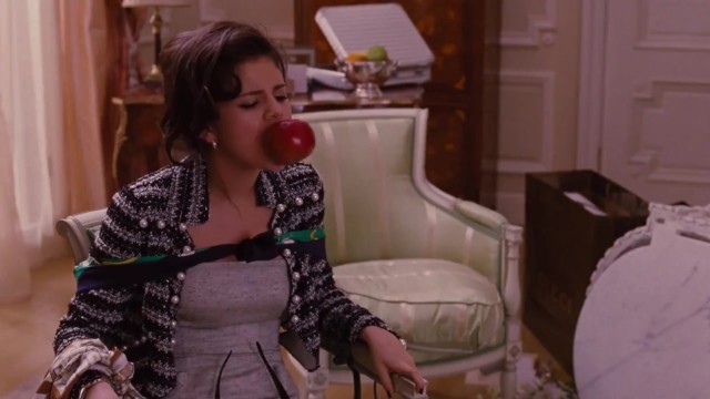 Selena Gomez gag with an apple in monte carlo film