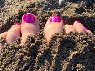Toes In The Sand At The Beach