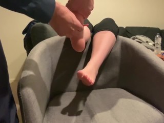 Tickling girlfriends tiny_teen feet on the couch