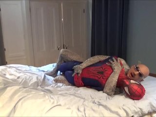 Spandex Snake Plays With Spiderman Dummy