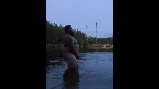 Outdoors In The Lake A Large Bear Masturbates