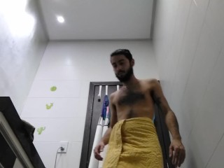Drying himself bathroom...